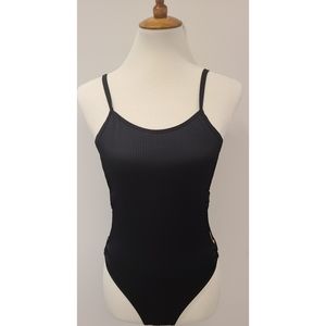 Black and gold one piece